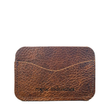 A Maine Rogue Industries Portland brown leather card case.