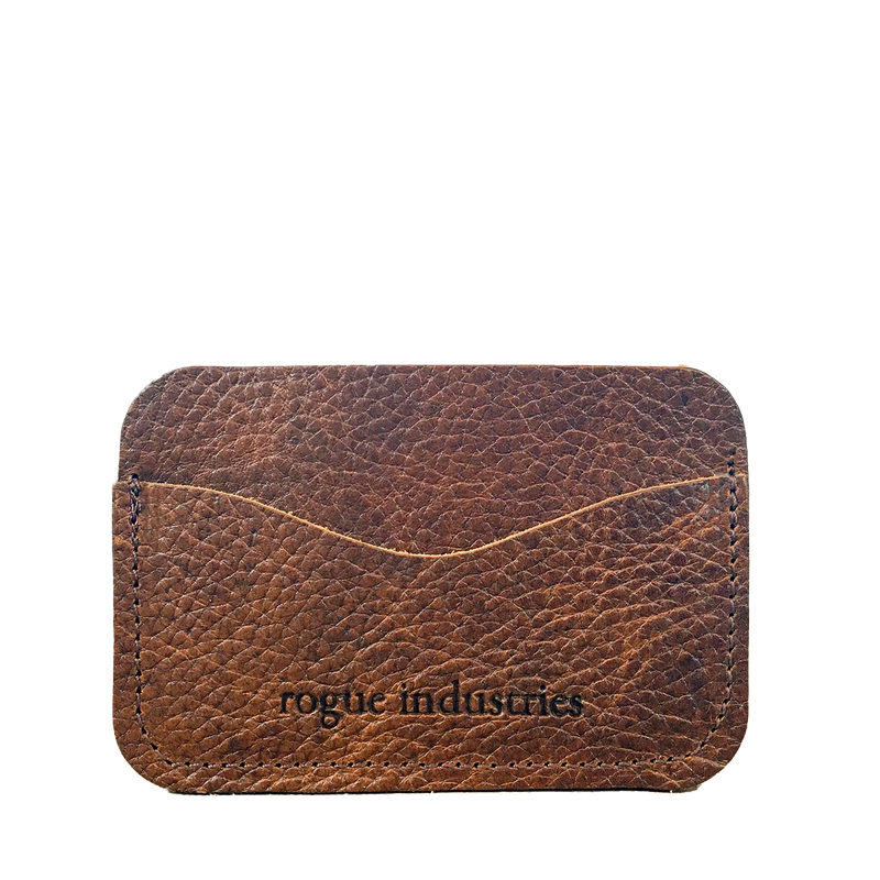 A Maine Rogue Industries Portland brown leather card case.
