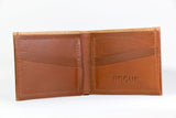 A genuine cowhide leather Heritage Wallet with a logo on it, made in the USA by Rogue Industries.