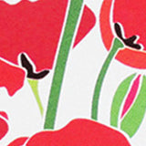 A close up of red poppies on a white background with Rogue Industries RFID Blocking credit card sleeves.
