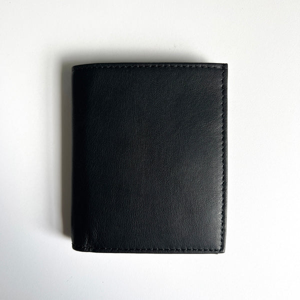 A premium Rogue Industries leather badge holder wallet on a white surface.