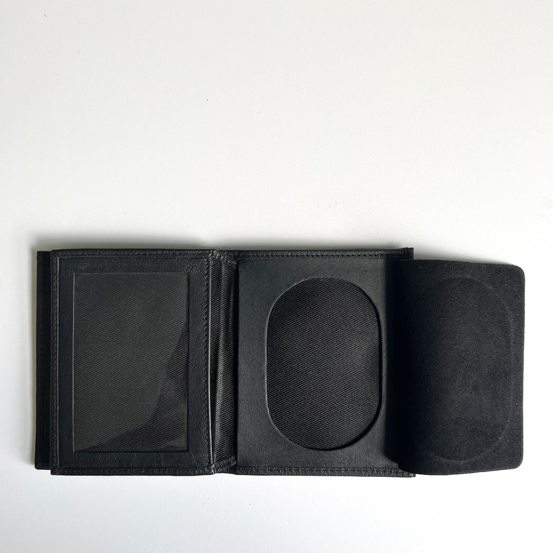 A premium Rogue Industries Leather Badge Holder Wallet, designed as a badge holder for first responders, on a white surface.