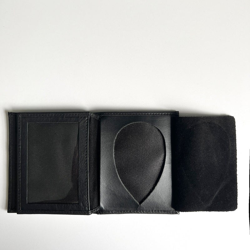 A premium Leather Badge Holder Wallet with a black leather cover from Rogue Industries.