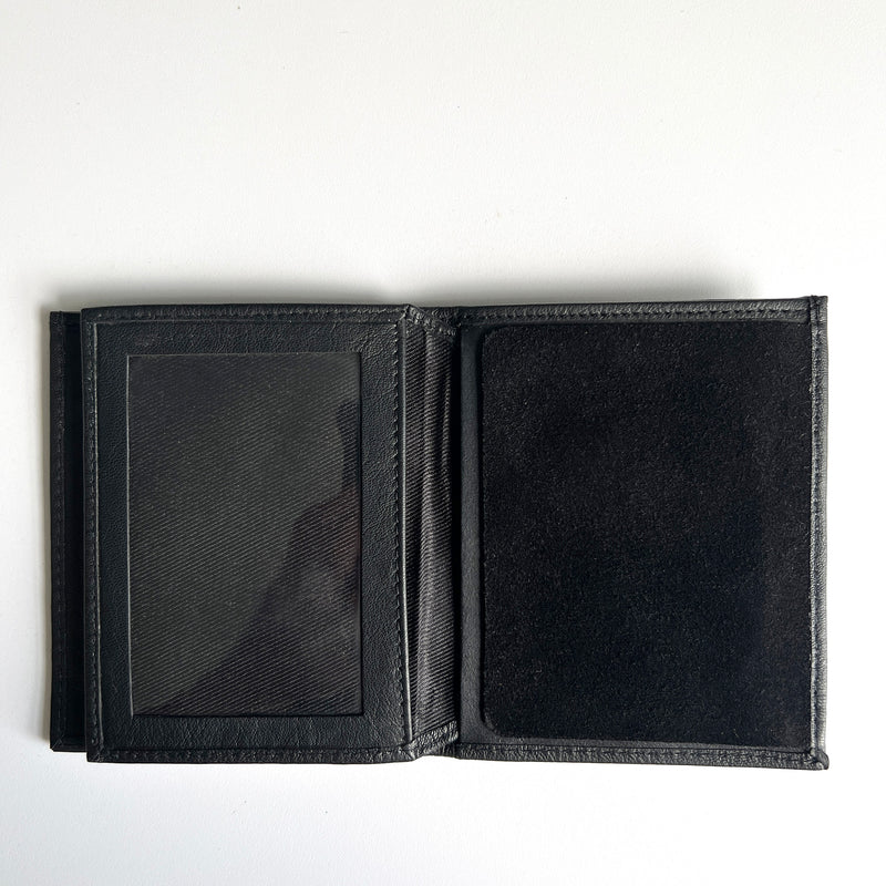 A premium Rogue Industries Leather Badge Holder Wallet, designed as a badge holder for first responders, on a white surface.