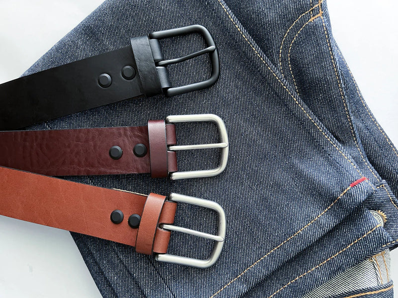 Three premium Baxter Belts from Rogue Industries on a pair of jeans.