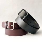 Three different colored Rogue Industries premium cowhide leather belts on a white background.