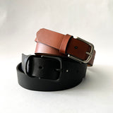 Three Chamberlain Leather Belts on a white background by Rogue Industries.