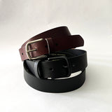 Three Chamberlain Leather Belts - 1.25" Wide from Rogue Industries stacked on top of each other.