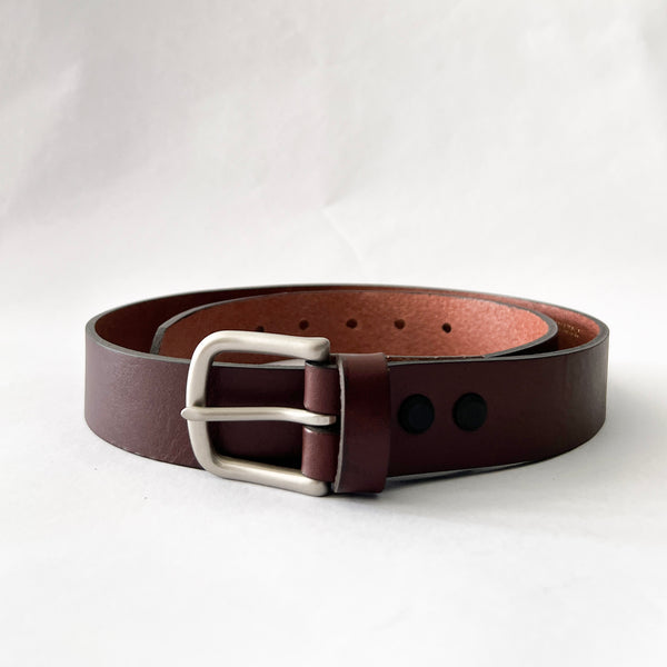 A handcrafted Chamberlain Leather Belt - 1.25" Wide by Rogue Industries on a white background.