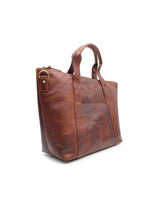 A brown full-grain leather Rockport Leather Weekend Tote on a white background by Rogue Industries.