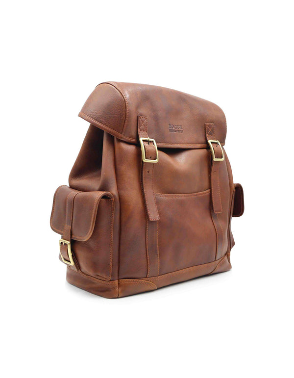 A brown top grain leather Highlander Leather Backpack with adjustable buckle closures on a white background by Rogue Industries.