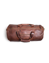 An imported Seal Cove Leather Duffle Bag by Rogue Industries on a white background.