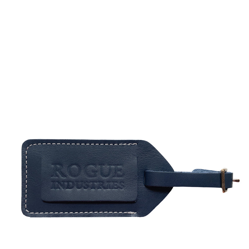 A blue Rogue cowhide leather luggage tag with the word "rogue" on it.