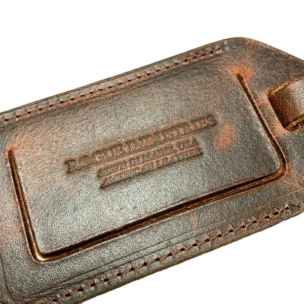 An image of a brown Rogue Leather Luggage Tag from Rogue Industries.