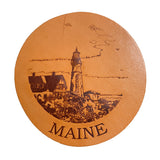 A Maine Lighthouse Coaster Set featuring Maine lighthouses by Rogue Industries.