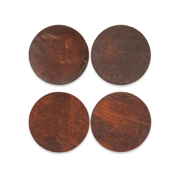 Four brown Rogue Industries Moose Leather Coasters on a white background.