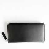 A black premium Leather Smartphone Clutch by Rogue Industries on a white surface.