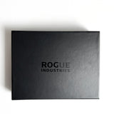A black Leather Passport Holder with the words Rogue Industries on it, designed for travelers.