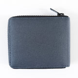 A grey Rogue Industries RFID blocking Nylon Zip Around Wallet with a YKK zipper on a white surface.