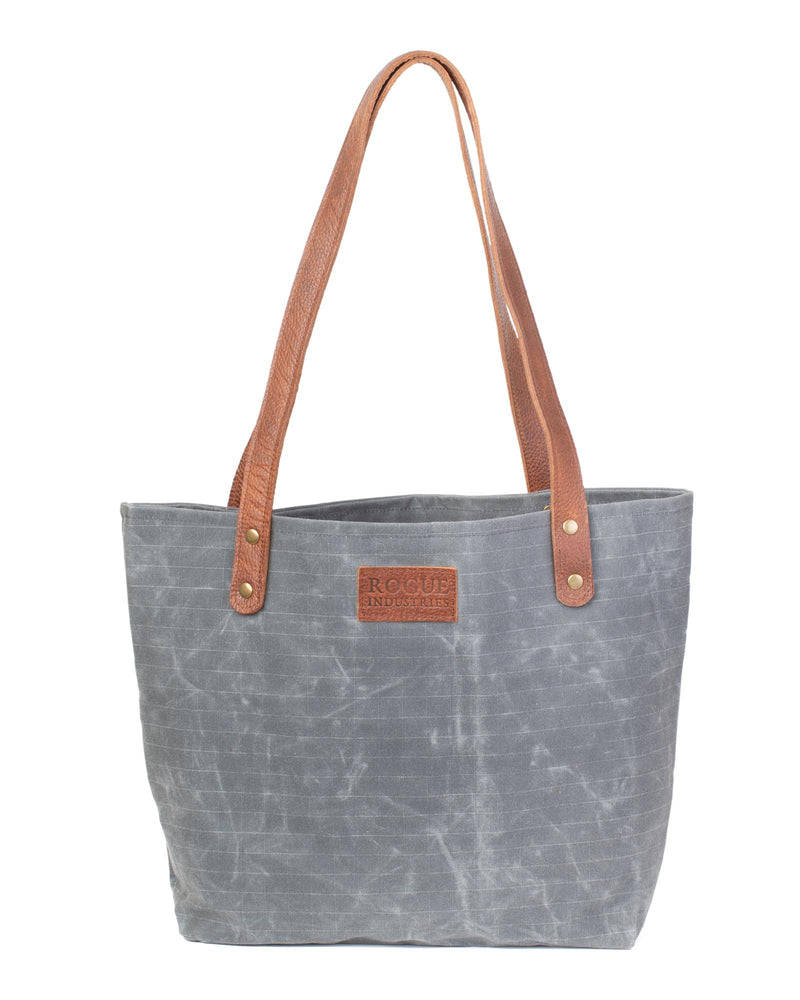 The durable Allagash River tote bag with brown leather handles by Rogue Industries.