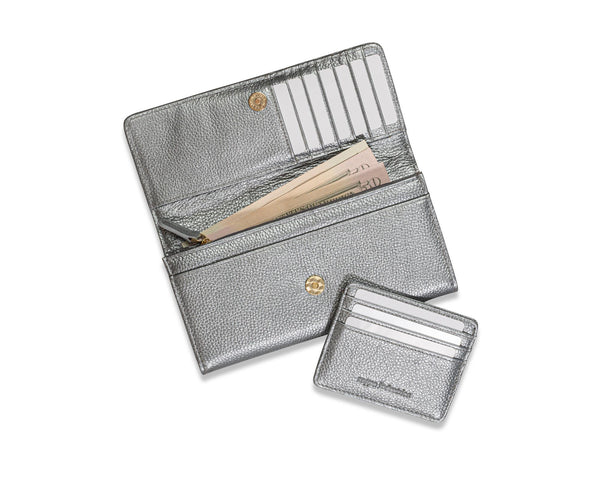 A Cambridge Clutch with Slim Card Case from Rogue Industries with money in it.