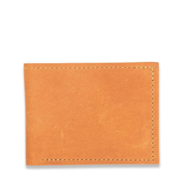 A Heritage Wallet in Baseball Glove Leather by Rogue Industries on a white background.