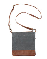 A grey and brown Rogue Industries Ellis River Crossbody Bag.