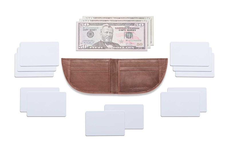 A Rogue Industries Expedition Front Pocket Wallet with a dollar bill, credit cards, and business cards.