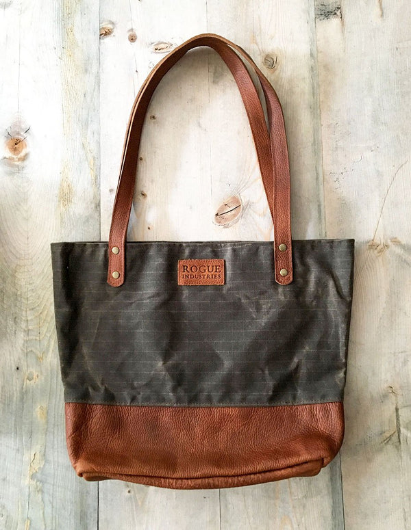 A brown and black Rogue Industries Saco River Tote Bag.