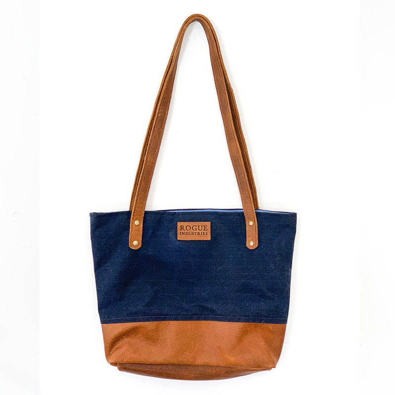 A blue and brown Rogue Industries Saco River Tote Bag.