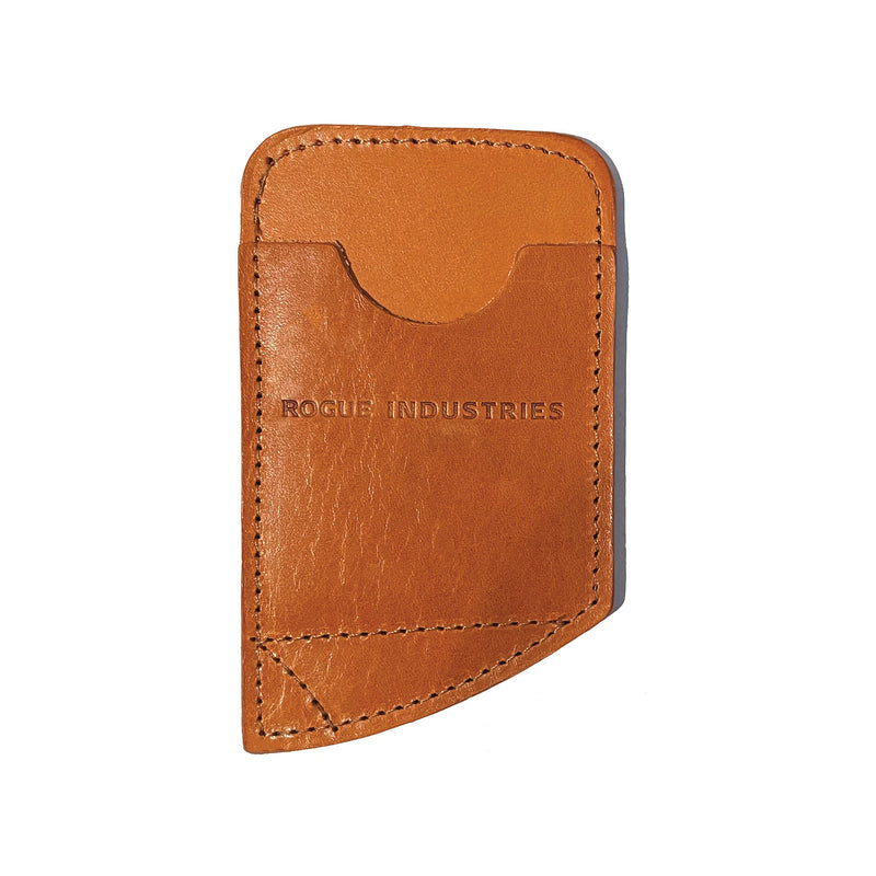 A slim leather card carrier from Rogue Industries with the words 'daily industries' on it, designed for comfortable carry in the front pocket.