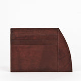 A Weekend Card Holder - 6 Series in brown top-grain leather by Rogue Industries on a white background.