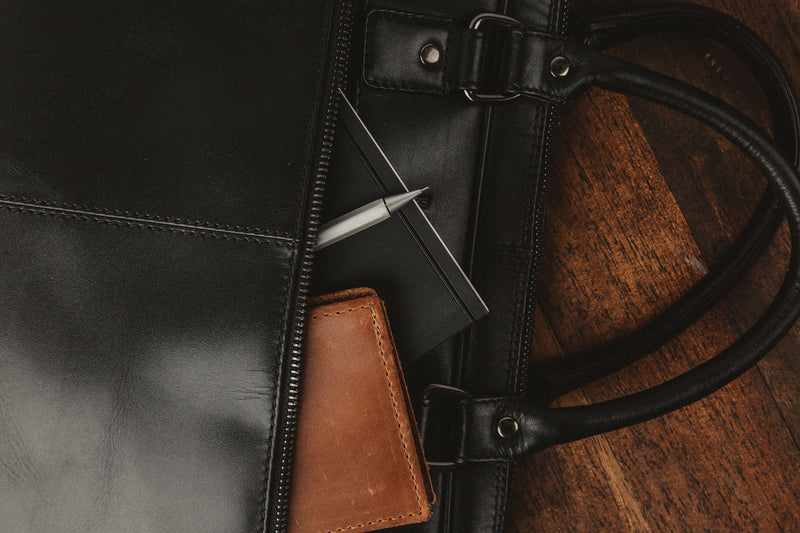 A West End Slim Leather Laptop Bag and wallet in a genuine leather black purse by Rogue Industries.