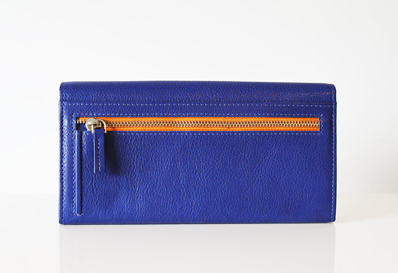 Campobello RFID Blocking Clutch wallet with a horizontal zipper on a white background.