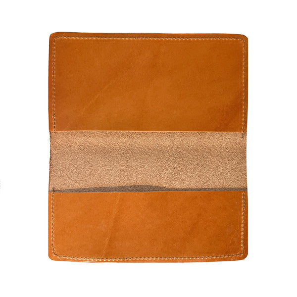 Factory Second - Leather Checkbook Cover by Rogue Industries opened and empty, isolated on a white background.