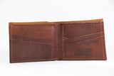 A brown genuine cowhide leather Heritage Wallet by Rogue Industries with a logo on it, made in USA.