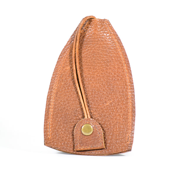A durable cowhide key fob case, featuring a brown, textured leather pouch with a snap button closure and a looped strap attached to the front. Introducing the Rogue Leather Key Protective Case by Rogue Industries.