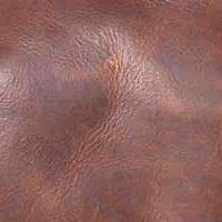 A close-up image of Rogue Industries' Seal Cove Leather Duffle Bag's imported brown top grain cowhide texture.