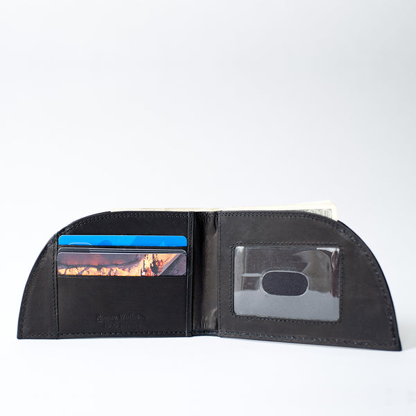 Black Rogue Industries Factory Second Made in Maine Front Pocket Wallet with cards and cash on a white background.