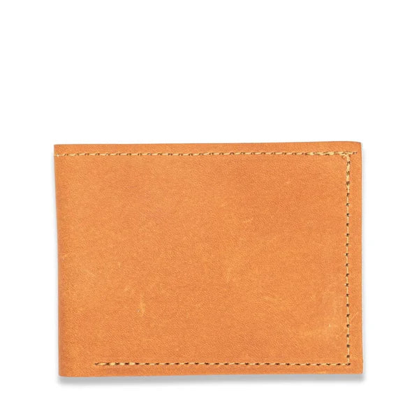 A tan Heritage Wallet - Previously Embossed Factory Second by Rogue Industries, crafted from genuine cowhide leather with visible stitching, is displayed against a white background. Made in Maine, this wallet combines timeless style with quality craftsmanship.