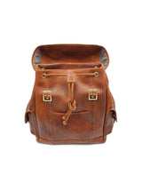 A Highlander Leather Backpack from Rogue Industries with adjustable buckle closures and two straps.