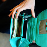 RFID Blocking Clutch - Rogue Industries - Ostrich Print Teal Open with Phone