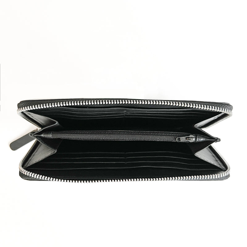 A black zippered clutch made of premium leather on a white background by Rogue Industries.